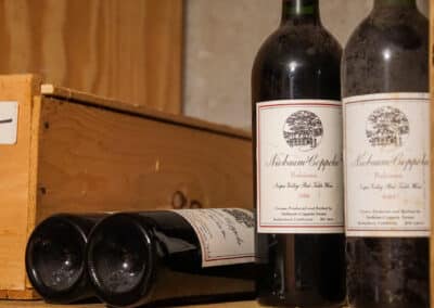 Bottles on a shelf in Le Chene's Wine Cellar - 2