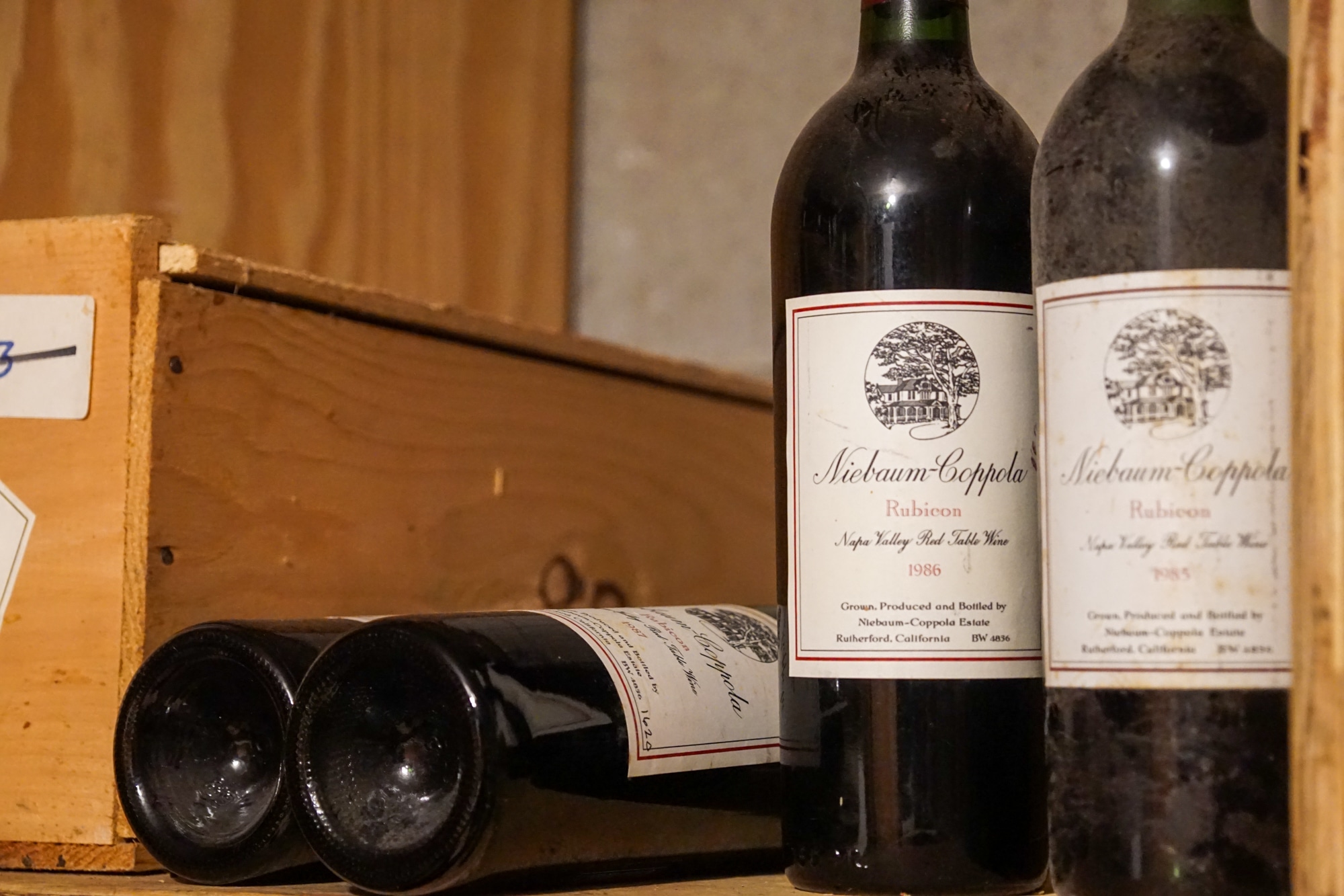 Bottles on a shelf in Le Chene's Wine Cellar - 2